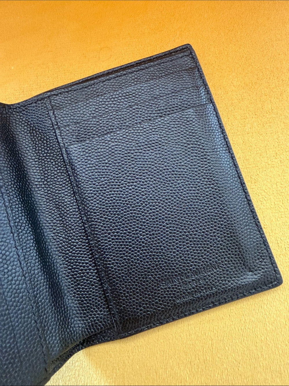 SAINT LAURENT men’s wallet Black Pebbled Leather Bifold Wallet. Gently used.